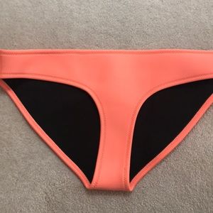 NWOT. Orange Triangle Bottoms.